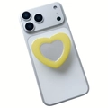 Dettaglio del supporto per telefono giallo a forma di cuore con specchio integrato - Supporto Espandibile / Giallo