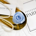 Light blue silk satin rose phone grip on a decorative gold tray with pearl accents - Blue