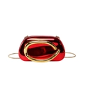 Metallic red acrylic clutch bag featuring a gold ring handle and snake chain strap - Red
