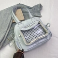Light blue square ita bag with clear PVC window and sweet ribbon bows on side - Blue