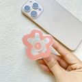 Détail du support de téléphone floral en acrylique rose avec base blanche rétractable - Fleur Rose