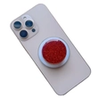 Close-up of red glitter resin magnetic phone grip on a white smartphone back - Magnetic Stand / Red Glitter