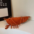 Quirky orange lobster-shaped saddle bag in premium faux leather with gold strap hooks - Brown