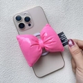 Macro detail of glossy pink bow magnetic phone grip with padded leather texture - Magnetic Stand / Rose Red Leather Bow