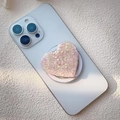 Detail view of heart-shaped glitter phone socket with pink sequins on a white smartphone - Multicolor Heart Sequin