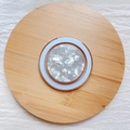 Detail of round MagSafe phone holder with shell pattern on a wooden tray with fabric - Magnetic Stand / Grey Shell Pattern