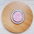 Macro view of round pink shell texture MagSafe phone grip with white ring details - Magnetic Stand / Pink Shell Pattern