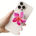 Pink plumeria acrylic magsafe phone grip stand attached to a white smartphone back - Magnetic Airbag Stand / Sweet Pink Gradient