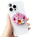 Detail of pink orchid phone socket with crystal rhinestones on a white smartphone - Pink Resin Orchid (Rhinestone Orchid-10)