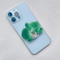 Macro shot of 3D orchid flower magnetic phone socket on a light blue smartphone - Dark Light Green Gradient Orchid Style (34)