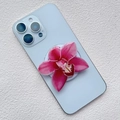 Top view of pink orchid magnetic phone grip attached to a light blue smartphone back - Pink Purple Simulation Orchid Style (5)