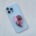 Close-up of pink variegated leaf phone socket mount on a light blue smartphone case - Pink Princess Philodendron Variegated Style (19)
