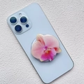 Pink orchid flower magnetic phone grip with semi-transparent petals on a blue smartphone - Pink White Gradient Highlight Orchid Style (7)