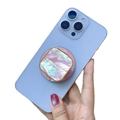 Pink and purple shell pattern magnetic phone stand with gold trim on a blue smartphone - Square Pink Scallop