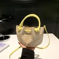 Mini yellow straw bucket bag with woven texture, leather drawstring and top handle - Yellow