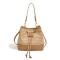 Summer woven straw bucket bag with leather trim for beach vacations and crossbody use - Milk Tea Apricot