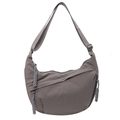 Dark grey nylon crescent crossbody bag featuring an adjustable strap and braided zipper pulls - One Size / Gray