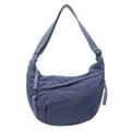 Navy blue dumpling crossbody bag in durable nylon with adjustable strap and woven zippers - One Size / Blue