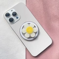 Dettaglio del supporto magnetico per telefono a margherita bianca con faccina felice - Fiore Sorridente Bianco