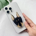 Detail of cute Doberman dog acrylic phone socket grip mounted on a white smartphone - Doberman Dog