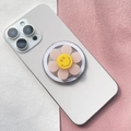 Dettaglio del supporto magnetico per telefono a fiore rosa con smile su smartphone - Fiore Sorridente Rosa