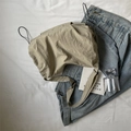Light khaki casual crossbody bag with adjustable strap and textured nylon fabric - Off White