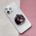Dettaglio dell'impugnatura popsocket in acrilico con gatto nero su smartphone bianco - Gatto in Sacco Nero