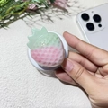 Close-up of strawberry-shaped MagSafe phone socket with pink gradient texture - Magnetic Stand / Glossy Pink Jade Strawberry