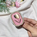Close-up of pearl-rimmed tulip magnetic phone grip with pink enamel and gold-edged design - Magnetic Stand / Pink Pearl Tulip