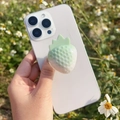Detailed macro view of a 3D resin strawberry phone grip with gradient texture - Light Snow Strawberry-Glossy