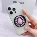 Detail of pink marble pattern stone phone socket grip on a white iPhone case - Radial Pink Marble Gem Style (11)