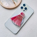 Nahaufnahme der roten Federball-Acryl-Handyhalterung auf weißem Smartphone-Gehäuse - Magnetischer Ständer / Badminton