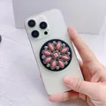 Detail of a vintage pink gemstone magnetic phone socket stand on a white smartphone - Rounded Rectangle Pink Gem Style (13)
