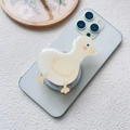 Detail view of a cute cartoon duck acrylic phone grip stand on a white smartphone - Magnetic Stand / Duck