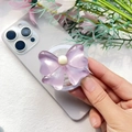 Dettaglio del supporto per telefono a farfalla viola con sfumatura traslucida e perla - Supporto Magnetico / Fiocco Viola