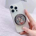 Close-up of bohemian style magnetic phone grip with colorful beads and silver floral relief - Radial Sunflower Style (5)