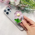 Dettaglio del supporto Magsafe a fiore con petali in resina rosa e una base verde - Supporto Magnetico / Girasole - Viola