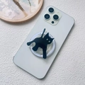 Detail of a black cat acrylic magnetic phone socket mounted on a white smartphone - Magnetic Stand / Black Cat
