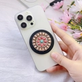 Detailed view of bohemian metal phone socket with ethnic patterns and colorful gemstones - Vintage Pattern Radial Gemstone (Songshi-5)
