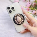 Detail of bohemian vintage green stone MagSafe phone grip with retro silver metal edging - Green Teardrop Stone with Vintage Wrap (Songshi-13)