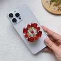 Detalle de soporte Magsafe con flor de cristal rojo y filigrana de aleación dorada fina - Soporte Magnético / Cristal artificial rojo