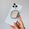 Dettaglio di uno smartphone bianco con supporto magnetico ovale a specchio per telefono - Supporto Magnetico / Specchio Ovale Nero
