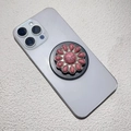 Close-up of pink marble sunflower phone socket stand attached to a purple smartphone - Sunflower Pink Texture Style (松石-17)