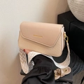 Beige woven crossbody bag with dual straps and elegant golden fashion lettering - Beige
