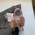 Sac à main rose texture litchi avec nœud en dentelle blanche et bandoulière réglable - Rose