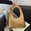 Metallic gold handbag with silver rivets decoration and integrated top handle - Gold