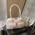 Minimalist cream white high-capacity pillow bag with polished finish and dual buckle pockets - White