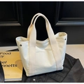 Borsa tote in tela beige con tasca anteriore e bottoni a pressione metallici laterali - Bianco
