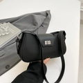 Minimalist black lychee leather crescent shoulder bag with silver metal rotating buckle - Black