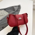 Chic red lychee grain leather crossbody bag with silver twist lock and slim shoulder strap - Red